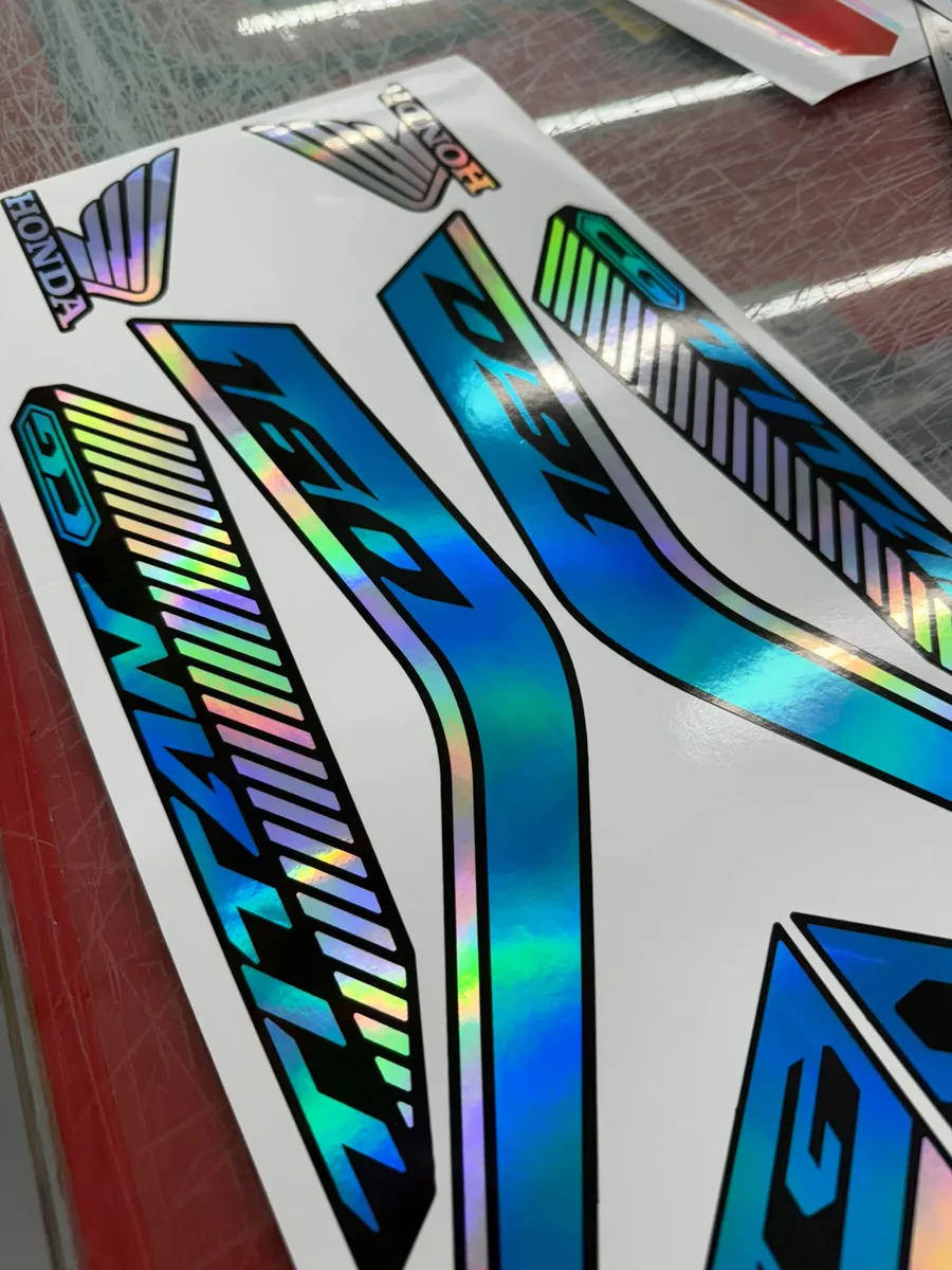D_NQ_NP_2X_958069-MLB95517542030_102025-F-kit-adesivo-holografico-titan-160-2223-vinil-decalque-motos